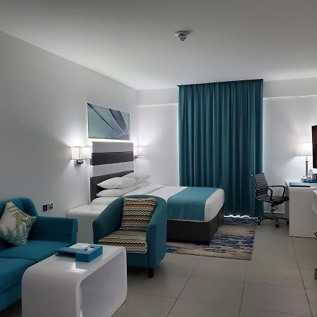 City Avenue Al Reqqa Hotel Dubai Bagian luar foto
